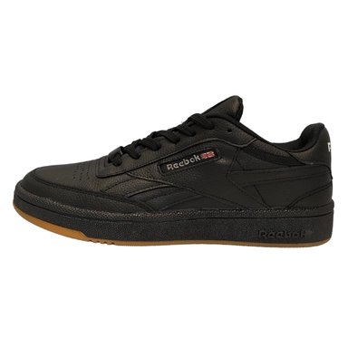 black Reebok sneakers with gum sole and lace-up design for casual everyday wear