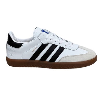 white and black striped sneakers with gum sole and classic low top design for casual wear