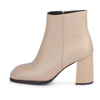 beige leather ankle boots with block heel and minimalist design for elegant everyday wear