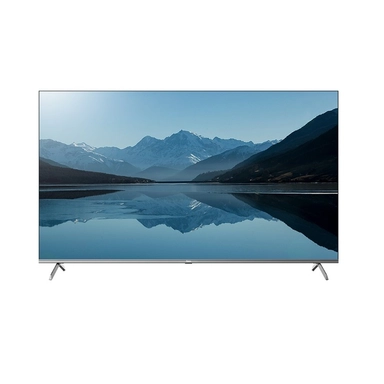 LED TV displaying a serene mountain landscape reflected in a calm lake.
