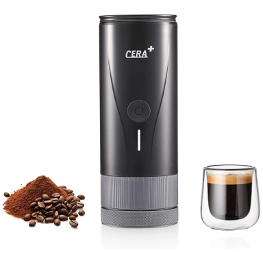 Portable black espresso maker with coffee beans and a glass of espresso.