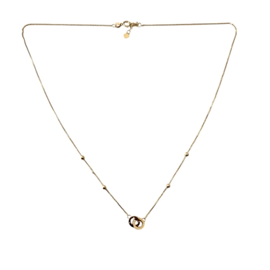 Gold necklace with delicate chain and interlocking ring pendant
