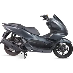 Dark gray maxi-scooter motorcycle with sleek design, side view on white background.