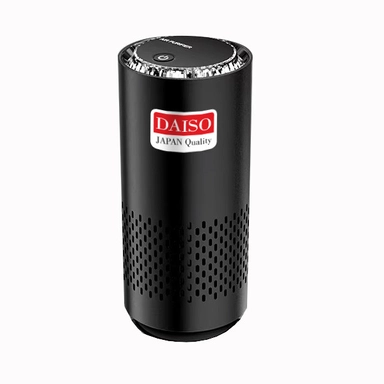 Black cylindrical Daiso Japan Quality mini air purifier with perforated lower section.