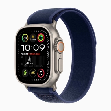 Apple Watch with blue fabric band and colorful activity display