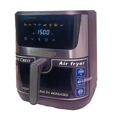 Silver  air fryer for cooking.