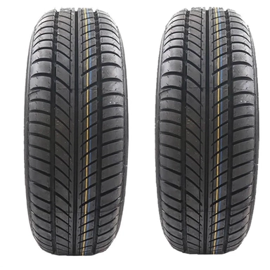 Pair of Yazd Tire Supreme tires on alloy wheels with a directional tread pattern.