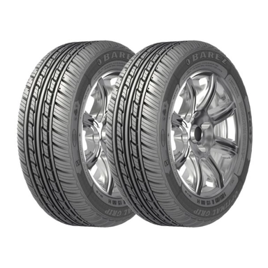 Two tires showing the tread face, with blue and yellow lines in the grooves.