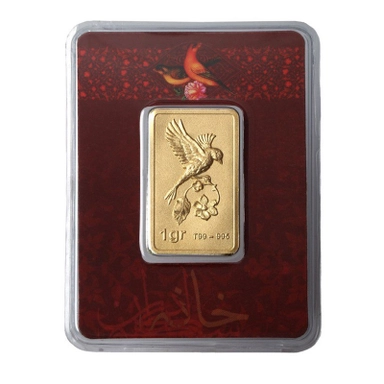 1 gram gold bar with bird design on red background card