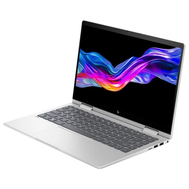 Silver HP laptop with colorful abstract wave wallpaper, angled view.