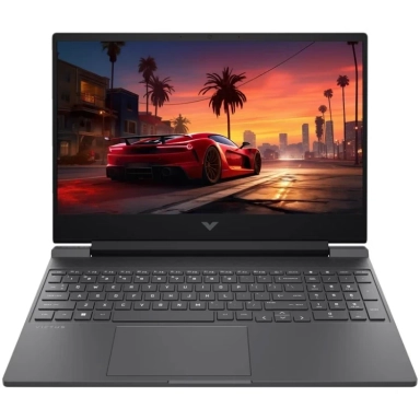 Lenovo laptop with black keyboard and colorful light burst wallpaper.