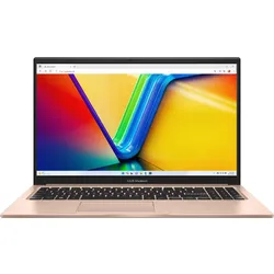 Golden laptop with colorful display screen on white background