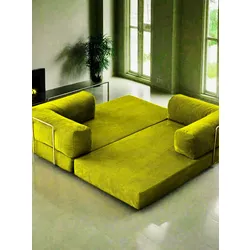 Bright green modular sofa bed with cylindrical cushions in a modern living room.