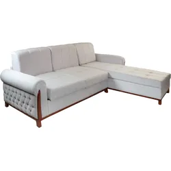 Light gray L-shaped sofa with wooden frame accents and tufted side details.