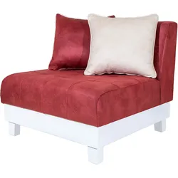 Red accent chair with white base and two decorative throw pillows.