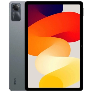 Redmi tablet with vibrant orange and yellow abstract wallpaper.