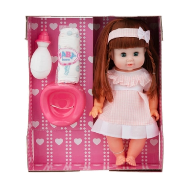 Baby doll playset with a pink dress, bottle, diaper, and potty in a heart-patterned box.