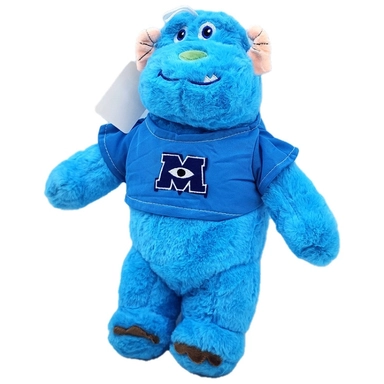 Blue plush monster toy wearing a Monsters University shirt with letter M logo.