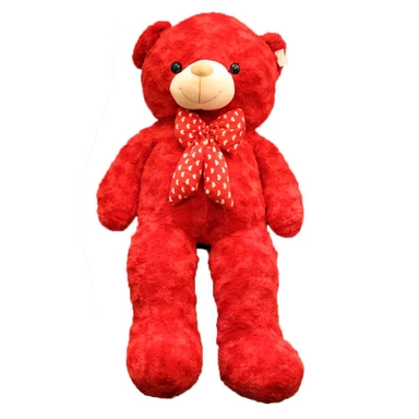 Large red teddy bear plush with polka dot bow tie.